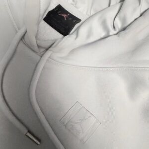 Light baby blue original AIR JORDAN  woman’s sheen wet resistant hoodie